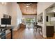 Open-concept living room with wood ceiling, hardwood floors, and bright natural light at 200 Maitland Ave # 96, Altamonte Springs, FL 32701