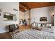 A living room featuring vaulted wood ceilings and view to the kitchen at 200 Maitland Ave # 96, Altamonte Springs, FL 32701