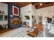 Living room with a brick fireplace and hardwood floors at 200 Maitland Ave # 96, Altamonte Springs, FL 32701