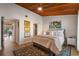 Inviting bedroom featuring unique decorations, a ceiling fan, and access to the closet at 200 Maitland Ave # 96, Altamonte Springs, FL 32701