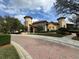 Elegant clubhouse with Mediterranean-inspired architecture and beautifully landscaped surroundings at 2205 W Lobelia Dr, Lake Mary, FL 32746