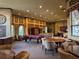 Elegant clubhouse featuring a pool table, seating areas, and kitchenette at 2205 W Lobelia Dr, Lake Mary, FL 32746