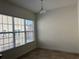 Bright dining area featuring large windows and neutral tones perfect for intimate meals and entertaining at 2205 W Lobelia Dr, Lake Mary, FL 32746