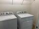 Practical laundry room features side-by-side washer and dryer at 2205 W Lobelia Dr, Lake Mary, FL 32746
