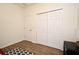 Bright bedroom featuring wood floors, a large closet, and neutral decor at 2659 Magpie Way, Sanford, FL 32773