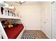 Charming bedroom featuring a cozy bunk bed with red linens and playful stuffed animals at 2659 Magpie Way, Sanford, FL 32773
