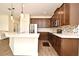 Modern kitchen features stainless steel appliances, stylish cabinets, and granite countertops at 2659 Magpie Way, Sanford, FL 32773