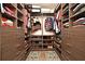 Custom closet with pull-out drawers, shelves, and plenty of storage space for clothes and accessories at 2659 Magpie Way, Sanford, FL 32773