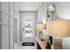 Inviting entryway with stylish decor and natural light streaming through the front door, creating a welcoming ambiance at 2940 Moulin Rd, Davenport, FL 33837