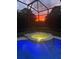 Backyard pool and spa offer a serene setting with a beautiful sunset backdrop at 305 Grand Reserve Dr, Davenport, FL 33837