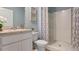 Well-appointed bathroom with a shower, vanity, and decorative accents at 3448 Costello Cir, Winter Haven, FL 33884