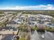 Aerial view of property with a pond and fountain in a desirable location at 411 Old Farm Ln, Winter Springs, FL 32708