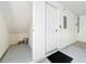 Spacious garage space with storage and a door leading to the interior of the home at 411 Old Farm Ln, Winter Springs, FL 32708