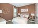 Charming bedroom with cozy bedding, soccer-themed decor, and plenty of natural light at 4698 Coral Harbour Rd, Kissimmee, FL 34758