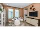 Cozy home office with natural light, built-in shelves, and a modern desk setup at 4698 Coral Harbour Rd, Kissimmee, FL 34758