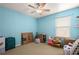 Unfurnished bedroom featuring blue walls, carpet floors, one window and a ceiling fan at 5019 Log Wagon Rd, Ocoee, FL 34761