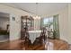 Bright dining area with hardwood floors, natural light, and stylish furnishings at 5019 Log Wagon Rd, Ocoee, FL 34761