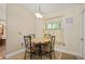 Bright breakfast nook with tile floors and a window providing natural light at 5019 Log Wagon Rd, Ocoee, FL 34761