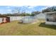 Above ground pool with white fence surrounding backyard at 5019 Log Wagon Rd, Ocoee, FL 34761