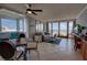 Inviting living area with ocean views, modern furnishings, and an open concept design at 5201 S Atlantic Ave # 301A, New Smyrna Beach, FL 32169