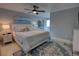 Bright and airy main bedroom featuring a king-size bed, ensuite bathroom access, and access to sunroom at 5201 S Atlantic Ave # 301A, New Smyrna Beach, FL 32169