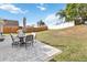 Well-maintained backyard with patio and privacy fence at 542 Bent Oak Loop, Davenport, FL 33837