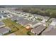 Residential neighborhood with neatly arranged homes, well-kept lawns, and tree-lined streets at 574 Lady Grace Pl, Deland, FL 32724