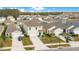 A vibrant residential neighborhood featuring neatly lined homes, manicured lawns, and a peaceful, suburban setting at 574 Lady Grace Pl, Deland, FL 32724