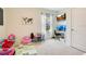 Playful bedroom with furniture, TV and dual-screen desktop setup at 574 Lady Grace Pl, Deland, FL 32724