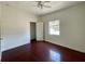 Bedroom featuring a ceiling fan and tile flooring at 580 Ryan Ave, Apopka, FL 32712