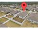 Aerial view of home with fenced in yard and other homes nearby at 5861 Bar Ranch Rd, St Cloud, FL 34771