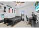 This bedroom is equipped with a ceiling fan, a workspace, and skateboard decor at 5861 Bar Ranch Rd, St Cloud, FL 34771