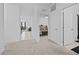 Bright hallway showcasing the home's open floor plan and neutral color scheme at 5861 Bar Ranch Rd, St Cloud, FL 34771
