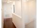 Second story hallway with access to the stairs and multiple other rooms at 608 Bluebill Ct, Kissimmee, FL 34759