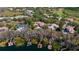 Panoramic aerial shot showcases luxurious homes, private boat docks, and lush green landscapes in an exclusive community at 6126 Kirkstone Ln, Windermere, FL 34786