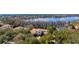 Magnificent home with tile roof, mature landscaping, and access to a beautiful lake at 6126 Kirkstone Ln, Windermere, FL 34786