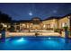 Elegant backyard with pool, patio, and meticulously maintained landscaping at 6126 Kirkstone Ln, Windermere, FL 34786