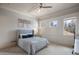 Bright bedroom with a patterned ceiling, ample natural light, and warm neutral tones at 6126 Kirkstone Ln, Windermere, FL 34786