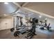 Spacious home gym with modern exercise equipment and ample natural light at 6126 Kirkstone Ln, Windermere, FL 34786