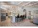 Modern kitchen with stainless appliances, light cabinetry, and a spacious center island at 6126 Kirkstone Ln, Windermere, FL 34786
