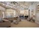 Large living room open to the kitchen with coffered ceiling at 6126 Kirkstone Ln, Windermere, FL 34786