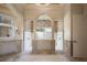 Elegant bathroom showing a double shower, tub, and vanity at 6126 Kirkstone Ln, Windermere, FL 34786