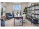 Well-lit office with desk, chairs, shelving, and a window offering pleasant natural light at 7083 Painted Bunting Way, St Cloud, FL 34773