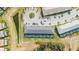Stunning aerial view of the homes showcasing lush landscaping and peaceful waterways, creating a serene living environment at 7509 Oak Spring Ln, Davenport, FL 33837
