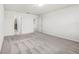 Neutral carpeted bedroom featuring ample space and access to the en-suite bathroom at 7509 Oak Spring Ln, Davenport, FL 33837