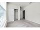 Bright bedroom with closet and window at 7509 Oak Spring Ln, Davenport, FL 33837