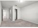 Comfortable carpeted bedroom with an ensuite and a closet at 7509 Oak Spring Ln, Davenport, FL 33837