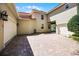 Spacious brick-paved driveway leading to a multi-car garage with mature landscaping at 8424 Lake Burden Cir, Windermere, FL 34786