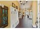 Entryway featuring tiled floors, a mudroom organizer, and an open view into the living spaces at 8424 Lake Burden Cir, Windermere, FL 34786
