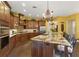 Gourmet kitchen with custom cabinets, granite countertops, and high-end appliances at 8424 Lake Burden Cir, Windermere, FL 34786